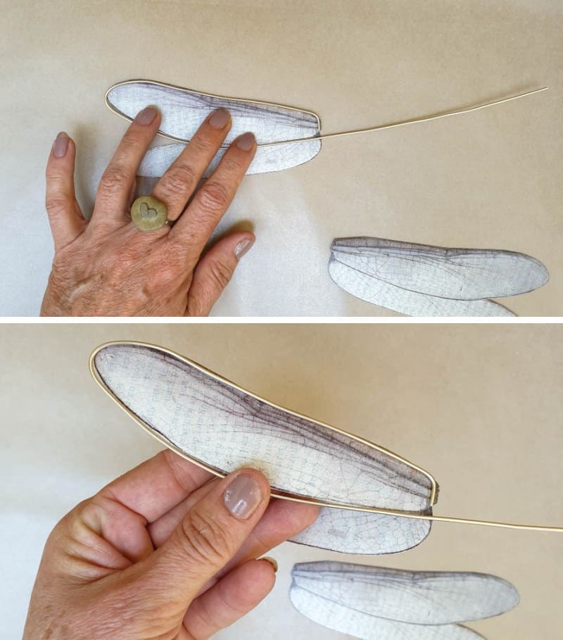 Glue the wire around the book page wings