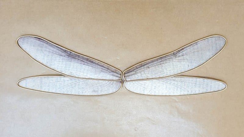 The completed wire and resin book page wings
