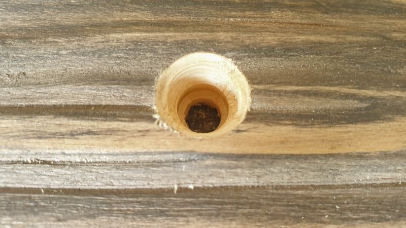 Use a step but or hole saw to make the holes