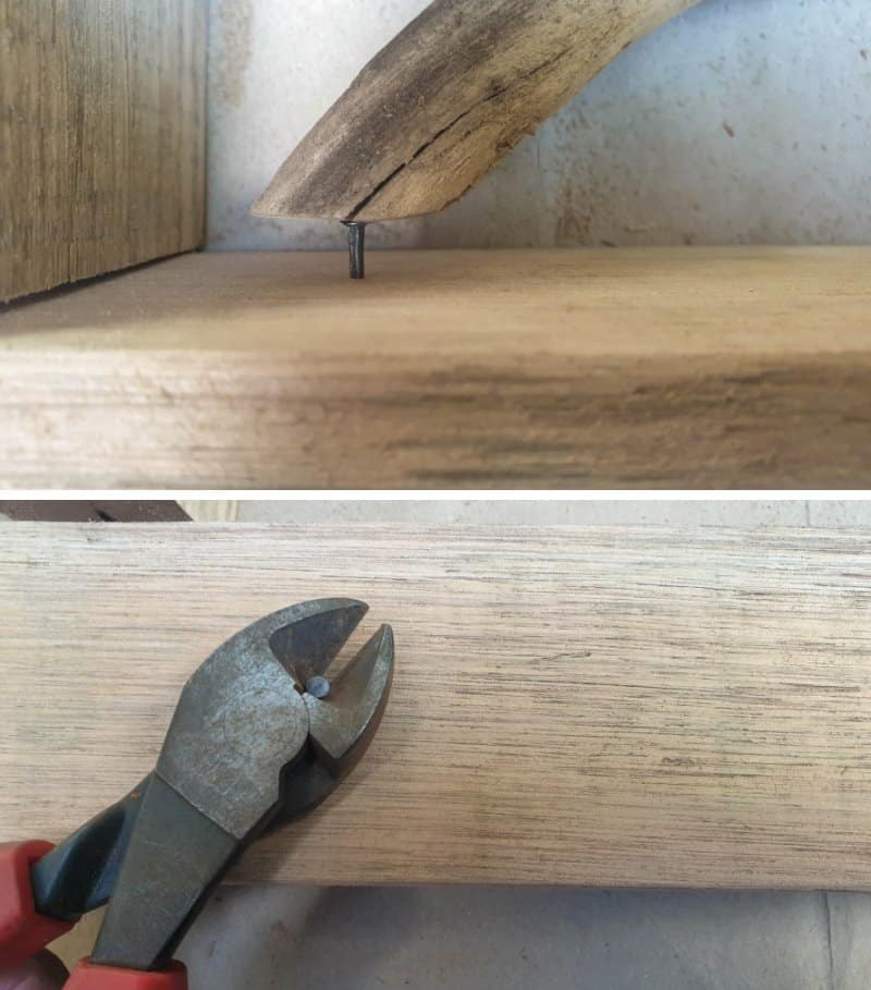 A nail is hammered into the bottom of the shadow box before assembling