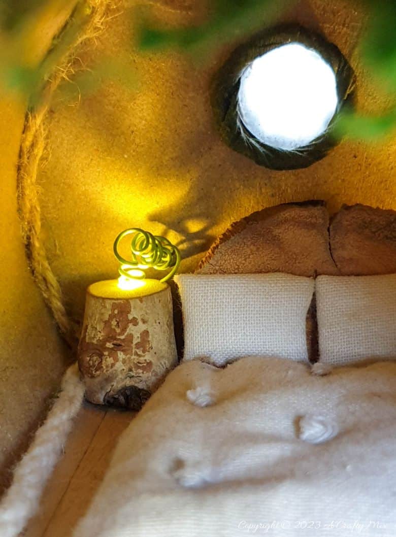 Check out this amazing repurposed tin can fairy Gypsy wagon tutorial! This whimsical creation will add a touch of magic to any garden or outdoor space, and it&rsquo;s perfect for any fairy or Gypsy looking for an adventure. Plus, it's a great way to reduce waste and give new life to throw-away stuff. What do you think of this creative and eco-friendly DIY project? Would you live in a tiny home like this? Get the full tutorial at A Crafty Mix