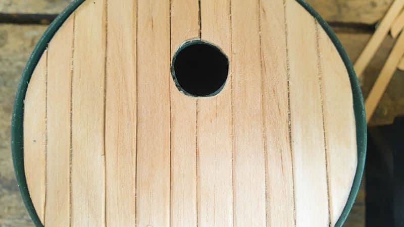Cut a hole in the back panel to make a window