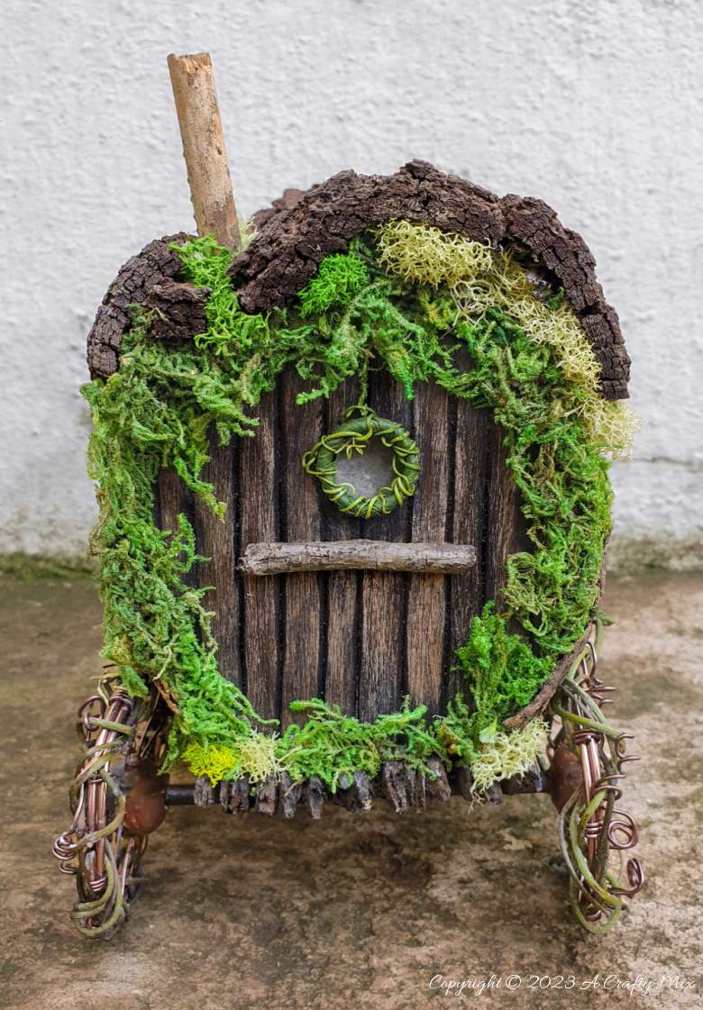 Check out this amazing repurposed tin can fairy Gypsy wagon tutorial! This whimsical creation will add a touch of magic to any garden or outdoor space, and it’s perfect for any fairy or Gypsy looking for an adventure. Plus, it's a great way to reduce waste and give new life to throw-away stuff. What do you think of this creative and eco-friendly DIY project? Would you live in a tiny home like this? Get the full tutorial at A Crafty Mix