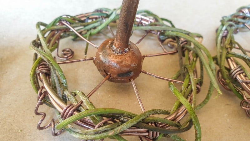 Insert the cut skewers into the hubs to make an axle