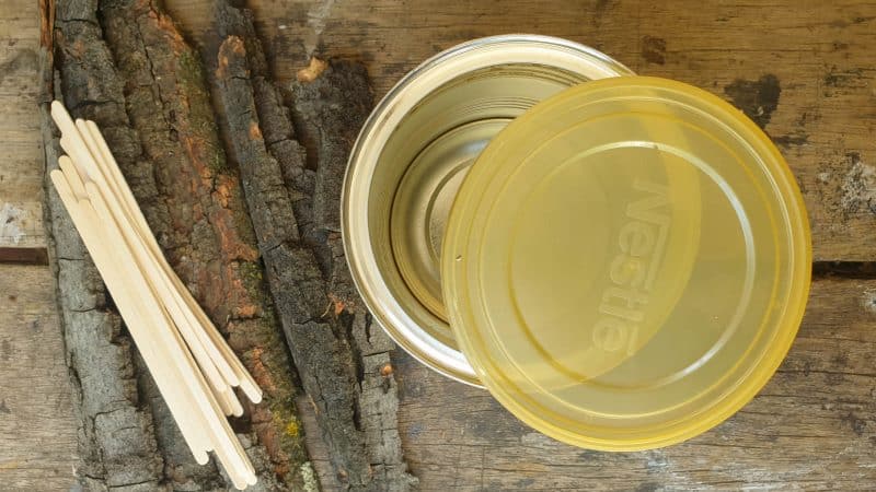 To make the fairy Gypsy wagon you need a empty tin can, wooden craft sticks and bark. The tin can should have a plastic lid if you want to make a door
