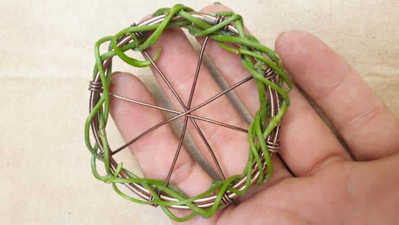 Wrap soft vines around the wheels