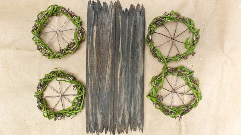 Four wire wagon wheels and a base