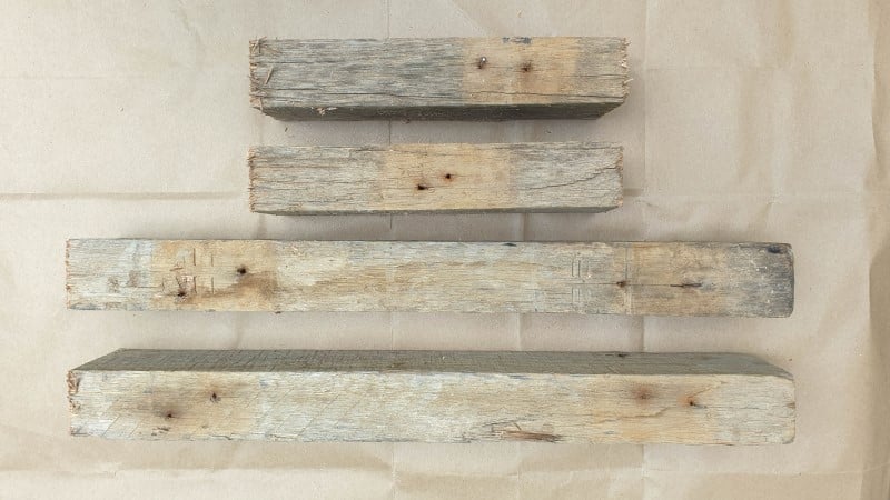 Weathered scaffolding planks cut to size