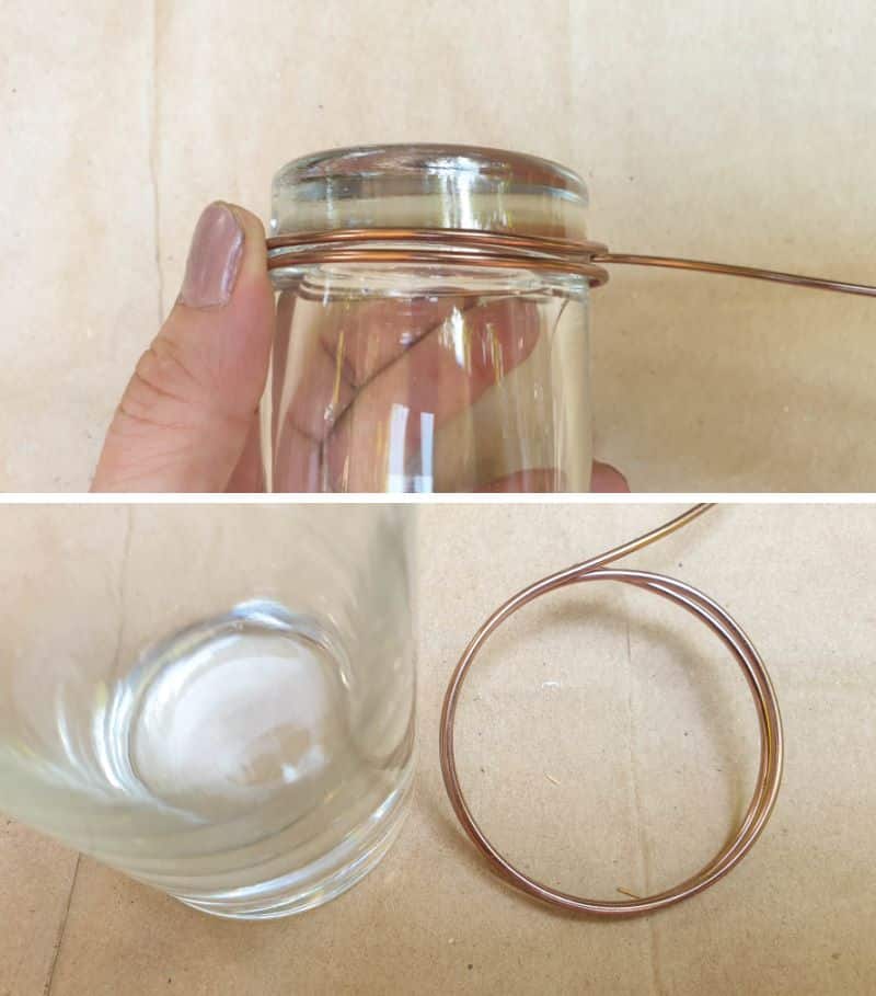 Wrap a piece of jewelry wire twice around a glass