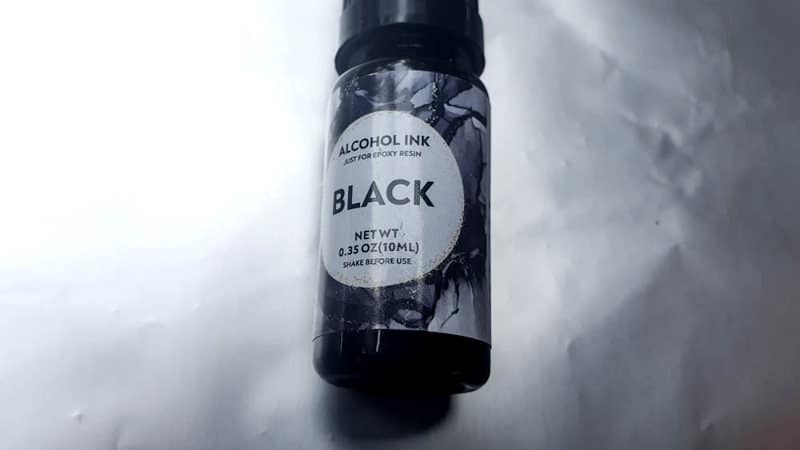 Use black alcohol ink to change the look of the foil
