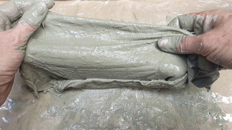 Soak the fabric in the thinset (tile adhesive) mixture and check that it's covered fully