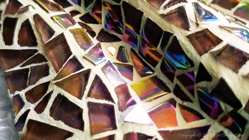 Creating your own mosaic substrate with folds and waves is both fun and rewarding. Not only does it add texture and depth to your artwork, but it also makes the final piece more dynamic and interesting. This step-by-step tutorial is filled with tips and tricks and will show you how to make your own using inexpensive materials that you can find anywhere. #ACraftyMix