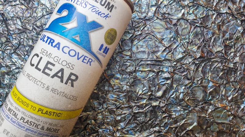 Apply 2 - 3 coats of clear varnish to seal and protect the alcohol ink