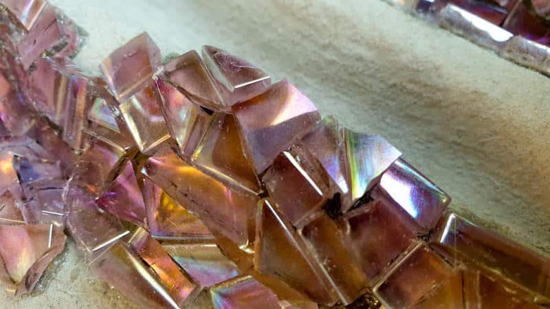 Work from the outside inwards as you lay down the tiles