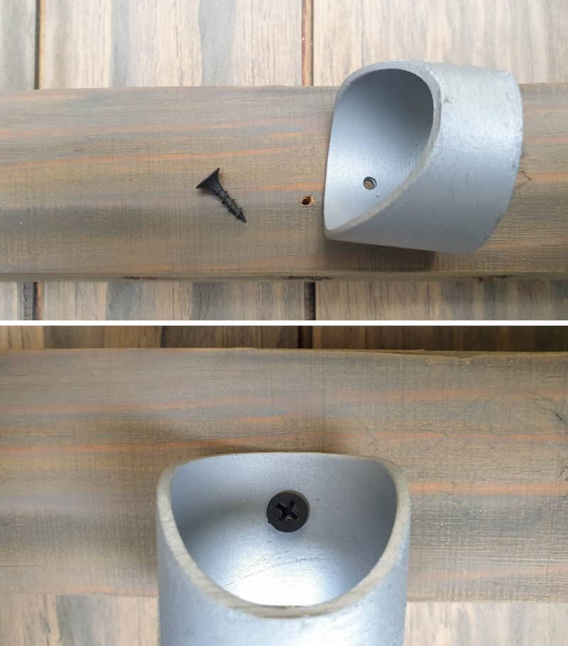 Screw the cut PVC pipes into the piece of wood