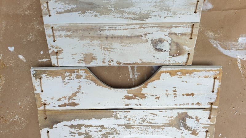 A view of the stitching on the sides of the handbag planter