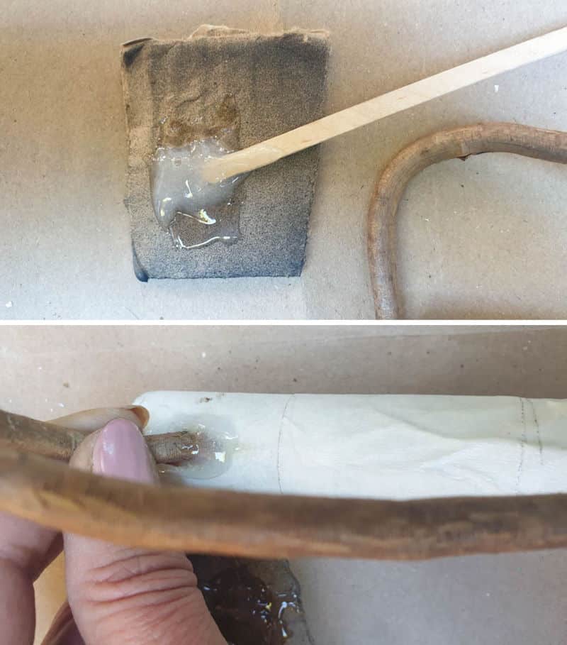 Mix two part epoxy and glue the root handle in place