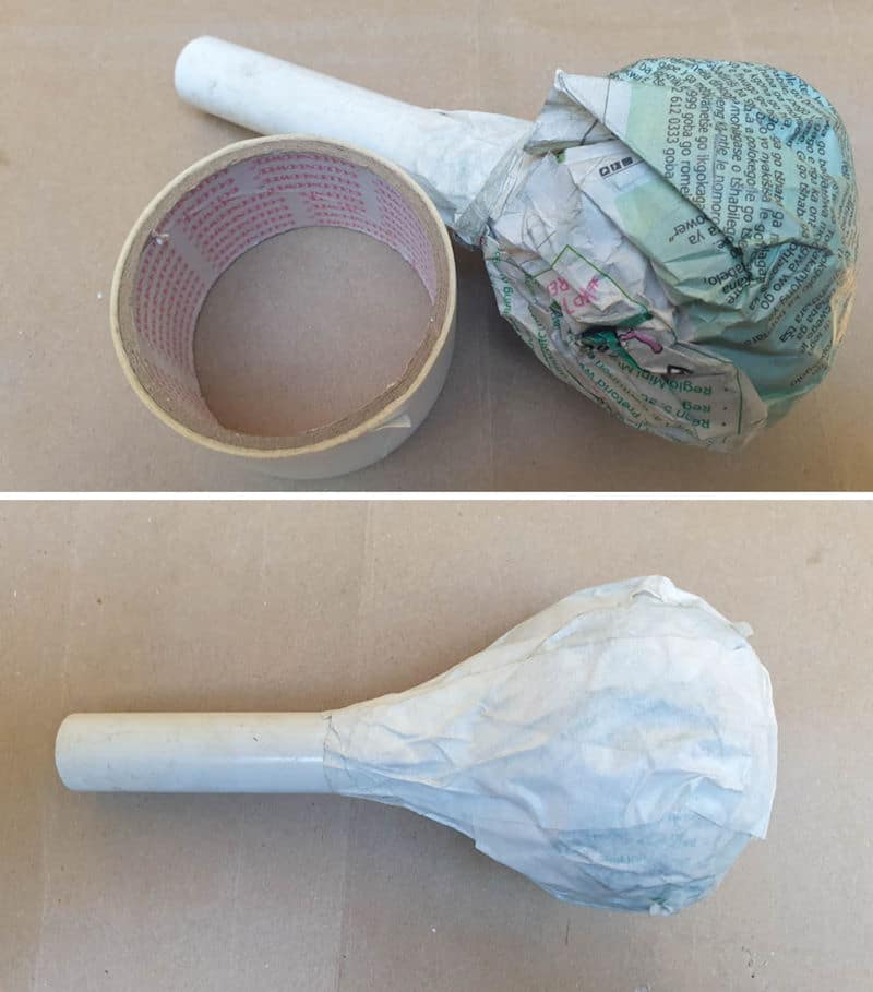 Wrap masking tape around the newspaper ball and PVC pipe