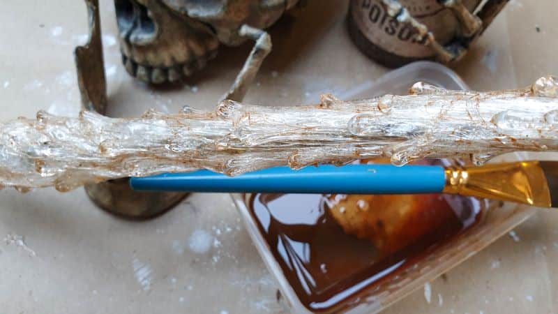 Use thinned down paint to age the cling wrap and glue