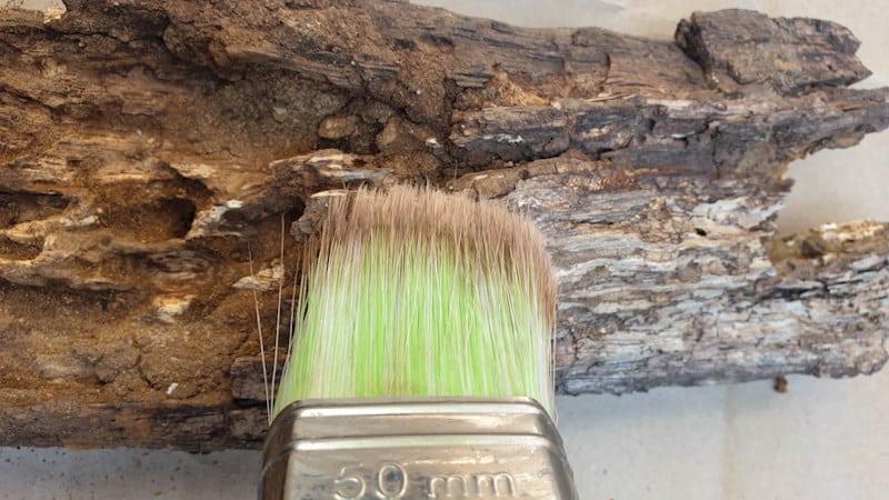 Brush away any dirt