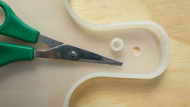 Trim away any silicone mold bits that may interfere with the wooden handle or the resin pour