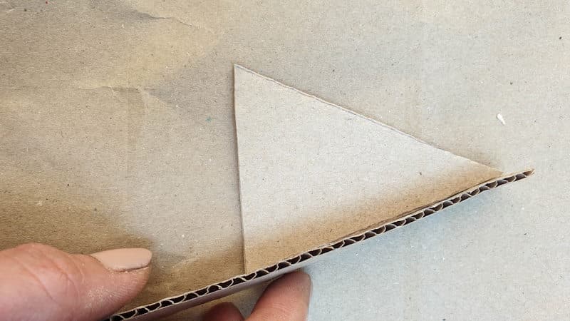 Build the easy cardboard mold by gluing or taping the walls to the base shape
