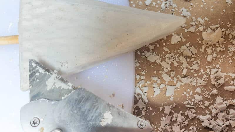 Sand or scrape the edges of the shape