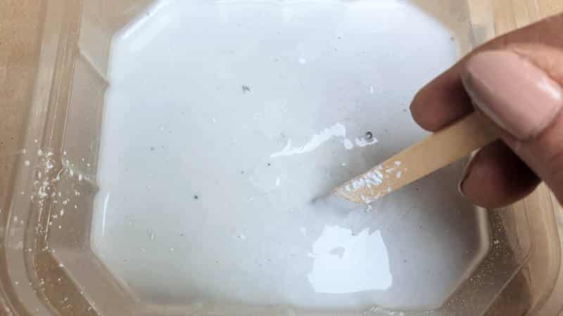 Gently stir the plaster of Paris