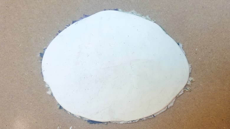 Once you've added the napkin to one side, flip it over and repeat the process of the other side