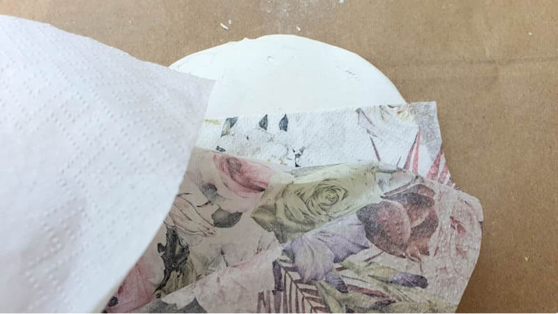 Separate the paper napkin layers. We'll only be using the printed layer