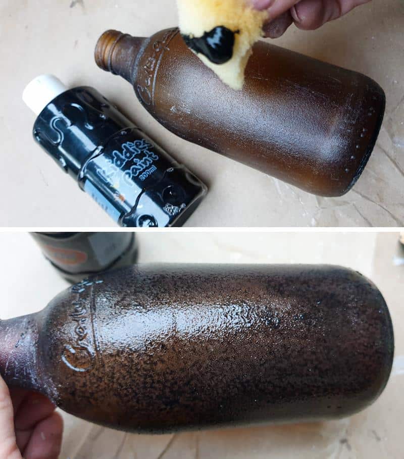 Use a sponge to dab cheap black craft paint all over the bottle