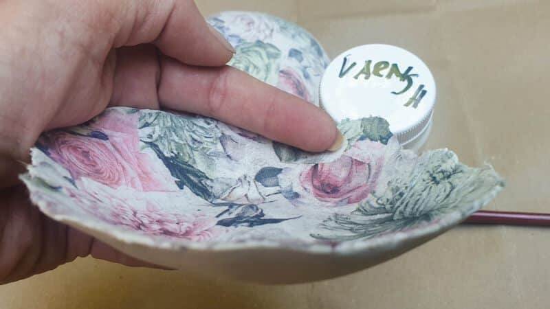 Varnish the bowls after they've been baked to protect