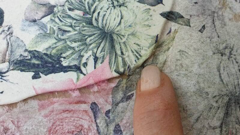 Wet the edge of the napkin and tear it away