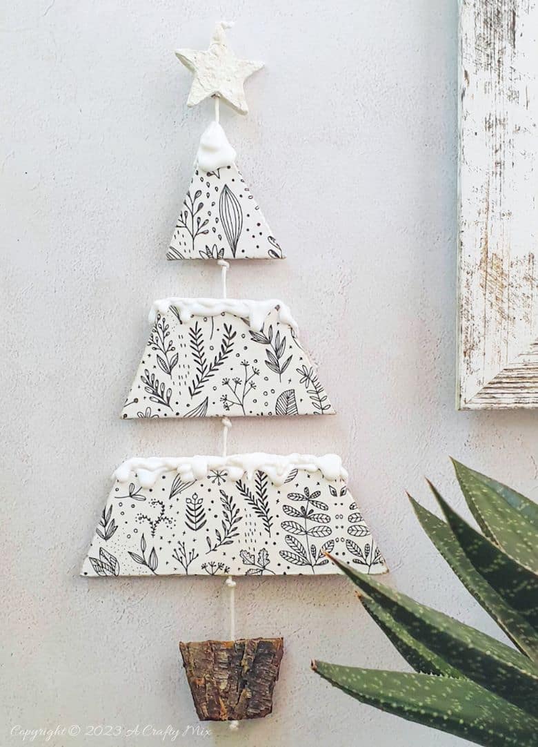 Get ready to deck the halls with handmade joy this festive season! Join us as we show you how to make an easy ornamental cardboard Christmas tree in three easy steps. It's a quick, kid-friendly craft that's can be customized in so many different ways. The little Xmas trees make great gifts too 