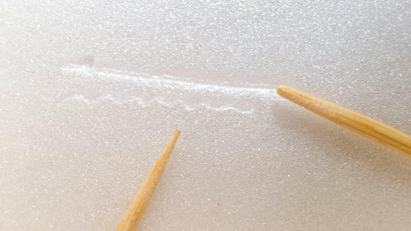 A close up view of the different lines you can get by drawing with a toothpick