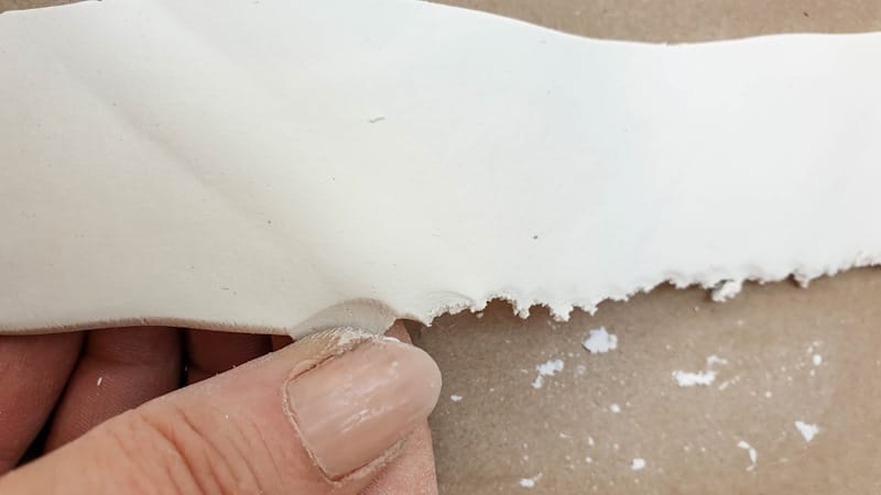 Gently rip the clay edges for a textured look