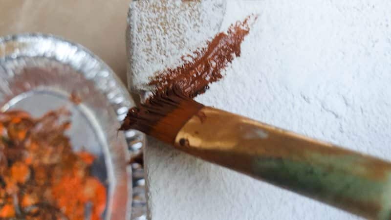 Paint the corners using the inexpensive craft paint rust mixture