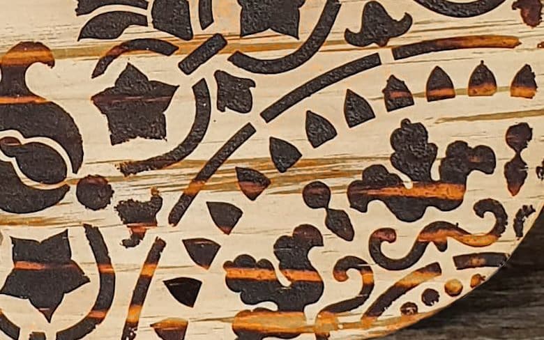 Streaks of resin in the pine that heat up and spread