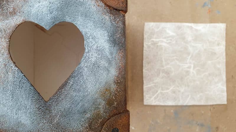 Use translucent paper to cover the letter cut outs