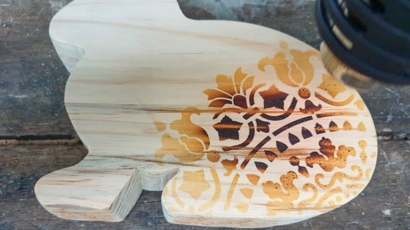 After applying the wood burning paste/gel, leave it to set for a few minutes before using a heat gun or blow torch