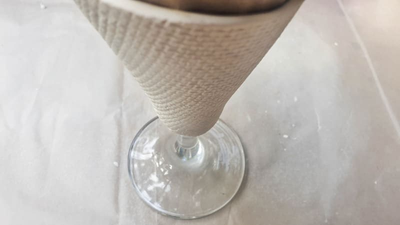 A view of the clay and wine glass stem vase before adding color