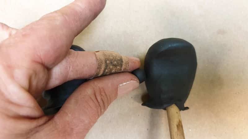 Add the thumb to the side of the palm