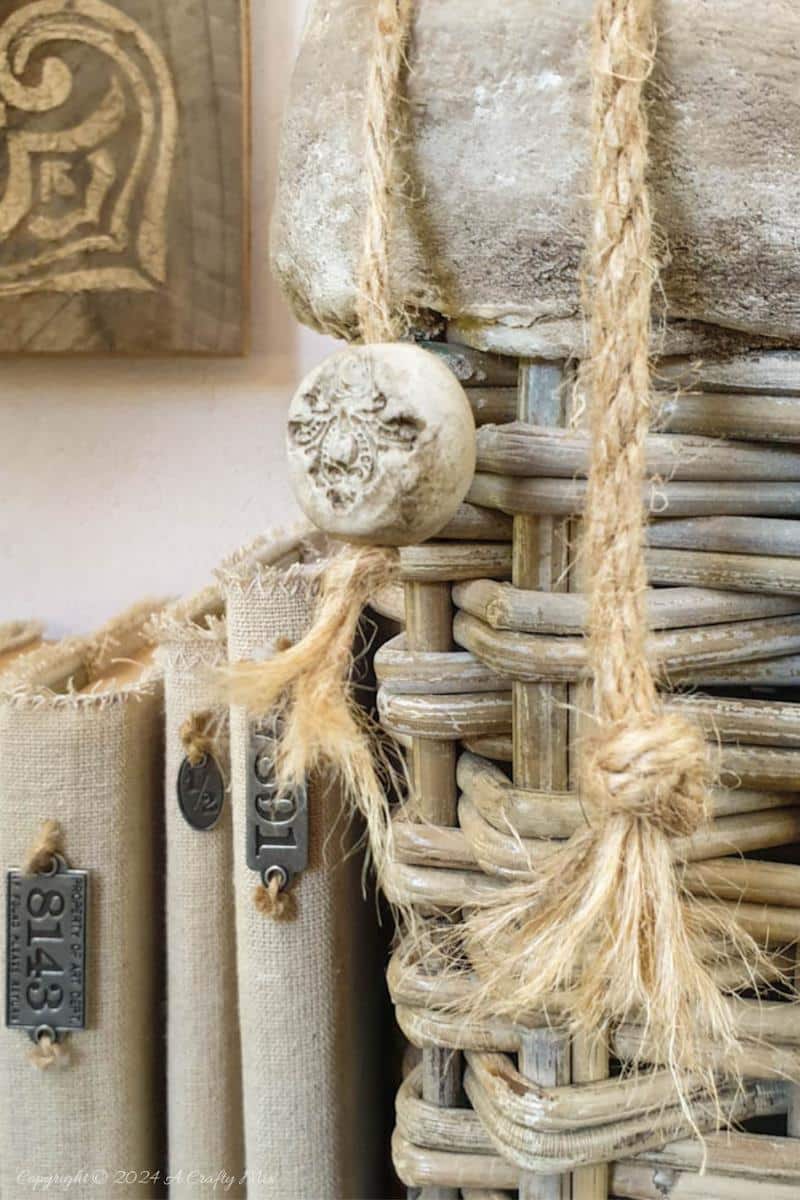 Breathe new life into an ordinary basket and turn it into stunning one-of-a-kind home d&eacute;cor full of character and vintage charm. Our detailed step-by-step tutorial will show you how to create this unique, eye-catching wicker woven oil basket using plaster of Paris, paper Mache, and a secret ingredient from the garden. 