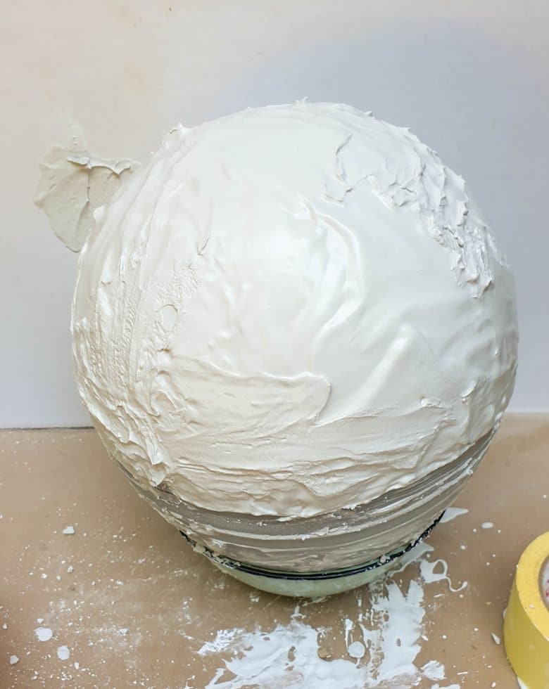 A balloon covered in casting stone