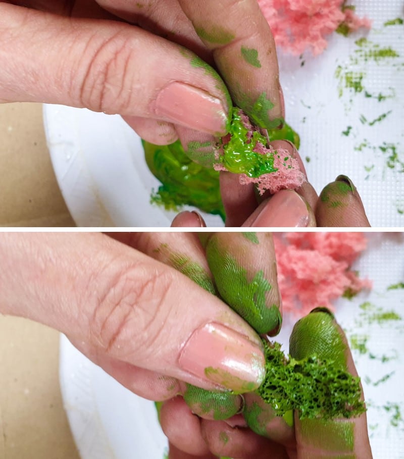Dip the sponge bits into the green craft paint