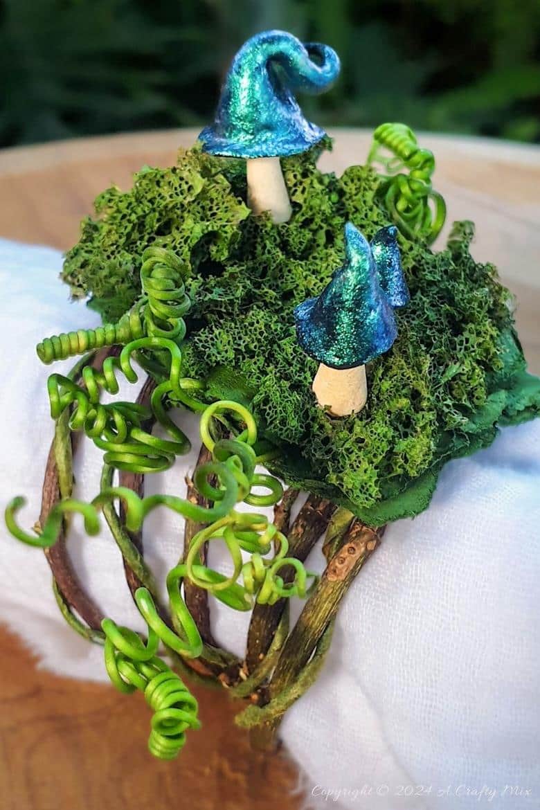Create your very own lush, fake moss using an unexpected crafting supply: a bath sponge! Yup, you heard right; a squishy, cheap old bath sponge. It's a simple, budget-friendly hack that’s quick and easy to do and the moss won’t dry out or fade. This tutorial also includes step-by-step instructions to make fairy napkin rings using the bath sponge moss.