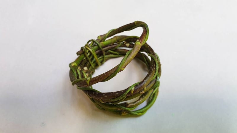 Wrap florist wire around the vines to secure and finish off the napkin ring