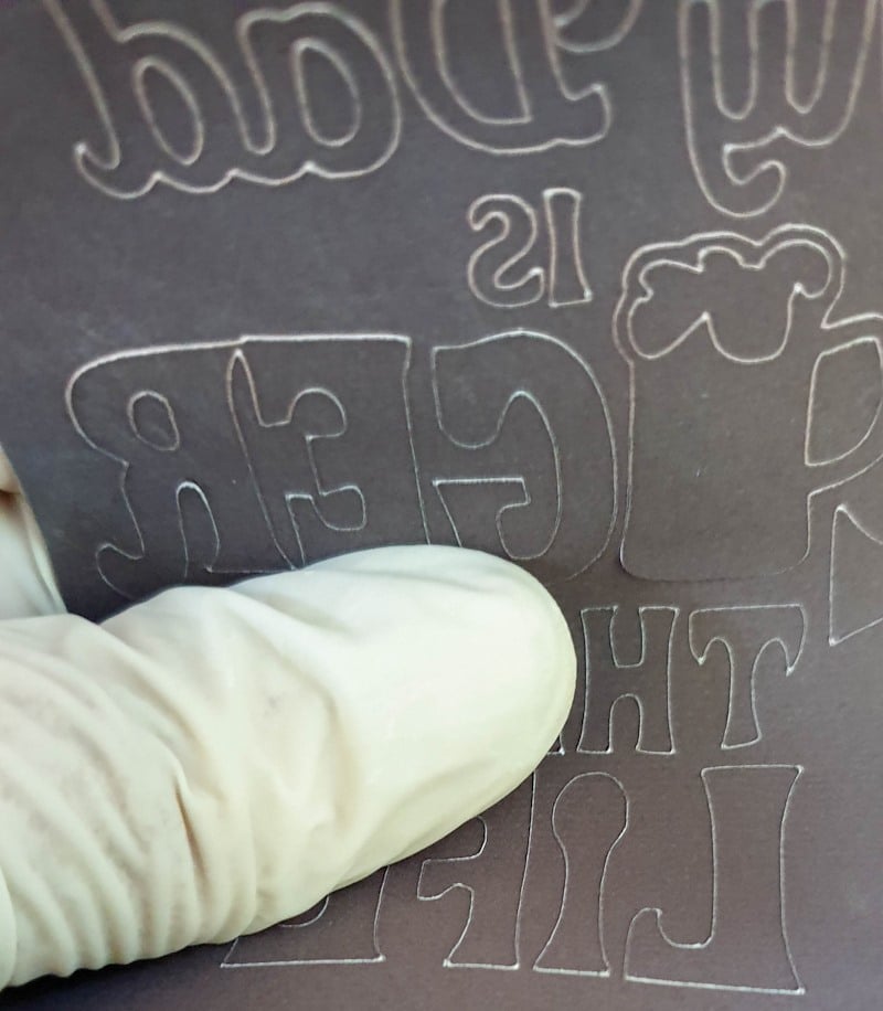 Roll the infusible ink sheet until you hear a slight cracking sound