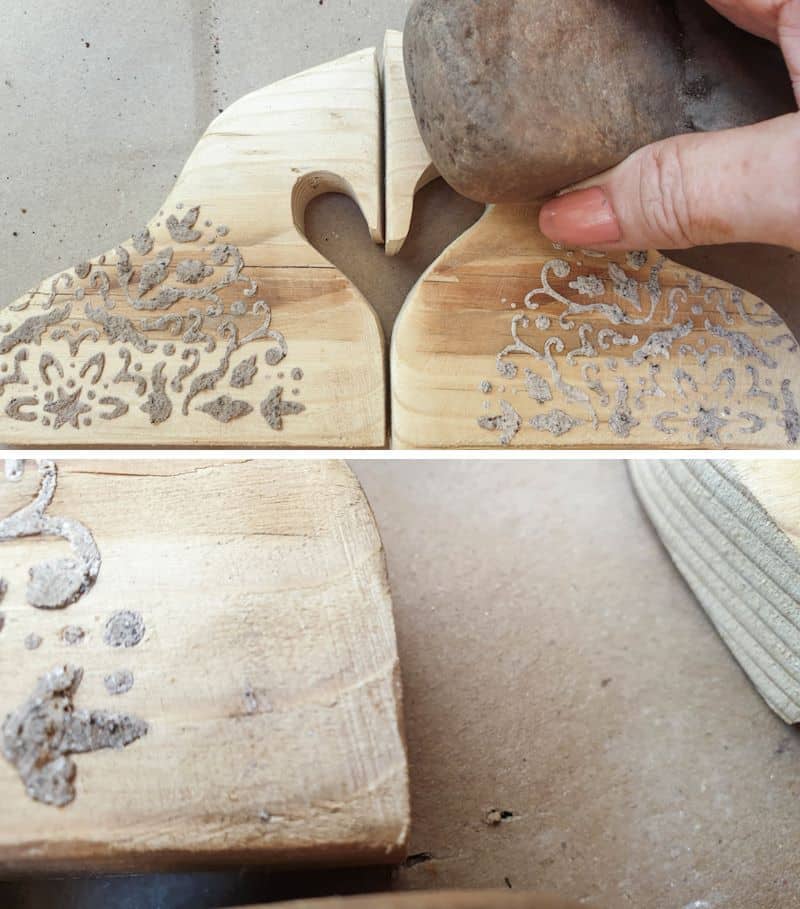 Use a pebble to make dents in the scrap wood horses