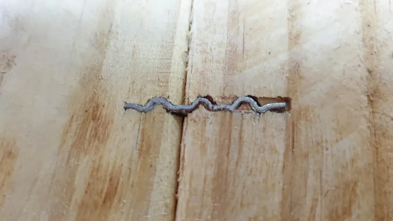 Use corrugated fasteners to join the salvaged wood together